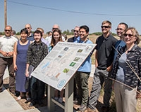 Faculty, students and administrators gathered to see the unveiling of the new interactive sign.